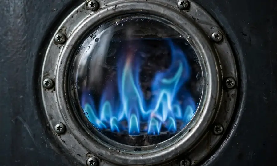 Illustration of blue gas flames inside a boiler